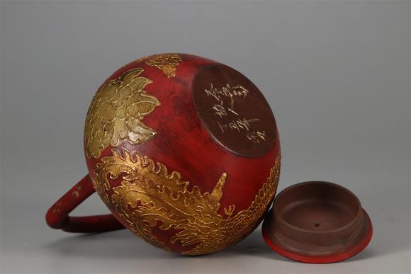 東京國(guó)際拍賣明代 陳用卿 漆器描金鳳紋提梁紫砂壺