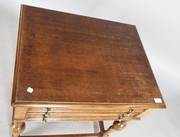 TooveysA George V oak two-drawer side table, height 77cm, width 71cm, depth 56cm.