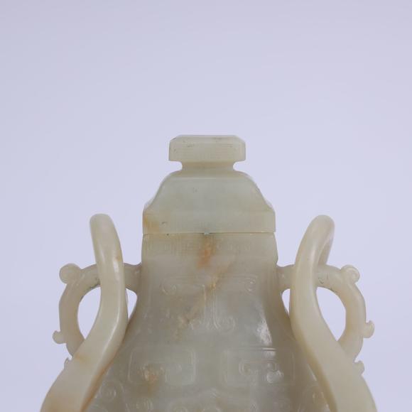 北京嘉翰白玉饕餮紋提梁瓶
