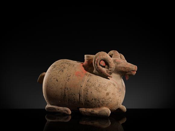 Galerie ZackeA LARGE PAINTED POTTERY ‘RAM’ VESSEL, ZUN, HAN DYNASTY