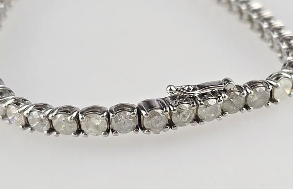 Auktionshaus BlankFeines 14K-Tennisarmband - Wei?gold 585/000 (14 K.), ausgefasst mit
