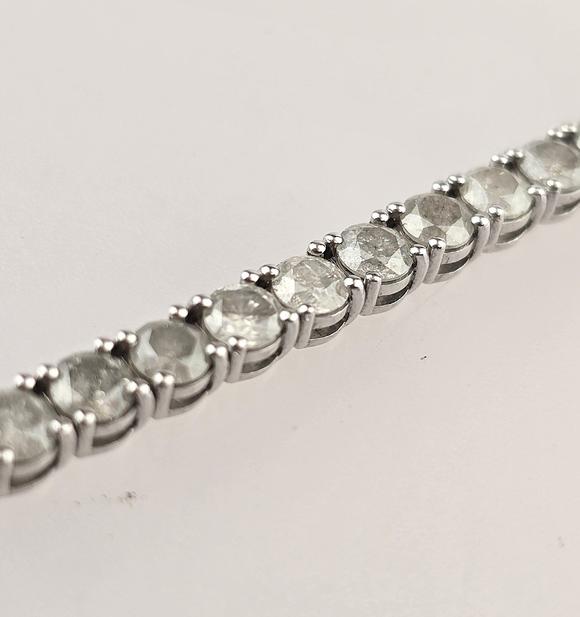 Auktionshaus BlankFeines 14K-Tennisarmband - Wei?gold 585/000 (14 K.), ausgefasst mit