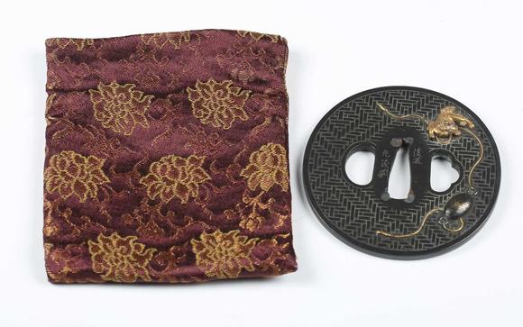 TooveysA very fine Japanese oval shakudo-inlaid bronze tsuba, Edo p