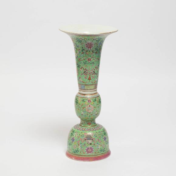 Waddington'sA Lime-Green Ground Famille Rose Gu-Form Vase, Daoguang Period (1821-1850), 清 道光 綠地粉彩八吉祥番蓮紋花觚