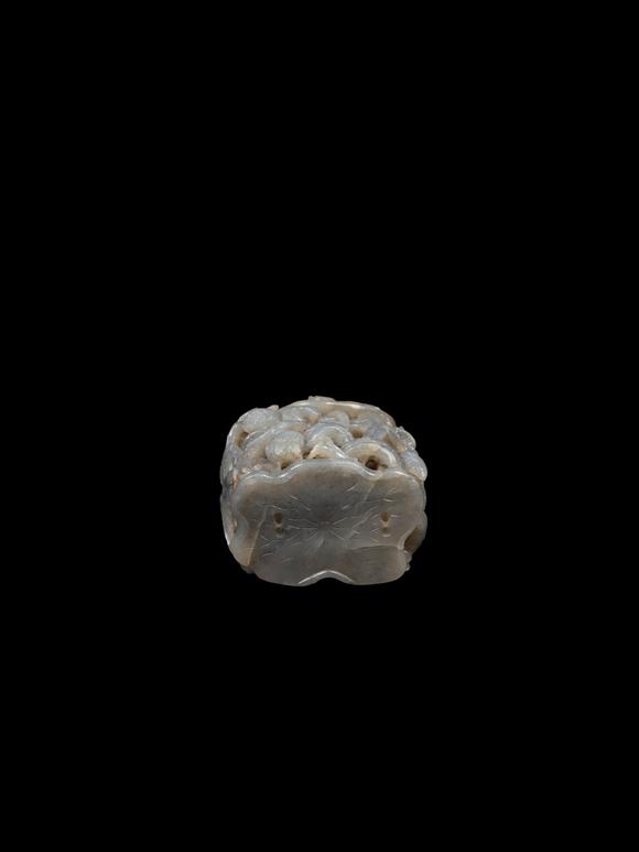 Marcopolo AuctionsA CELADON JADE GROUP, China, 19th / 20th century