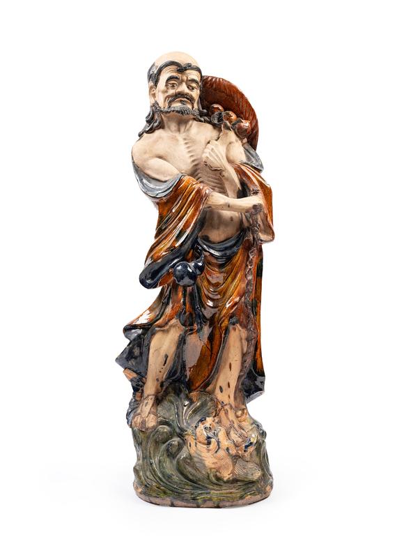 Marcopolo AuctionsA HUGE SHIWAN CERAMIC FIGURE OF A LUOHAN, China, Qing dynasty (1644-1911)