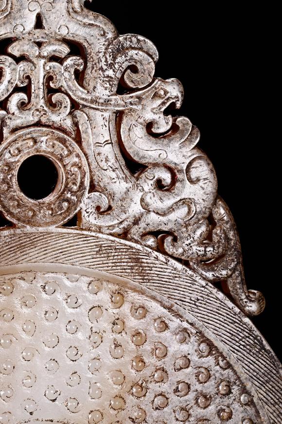 JUBAO HALL AUCTION HOUSE INCPre-Ming Dynasty Jade Bi Disc with Dragon, Phoenix and Grain Patterns