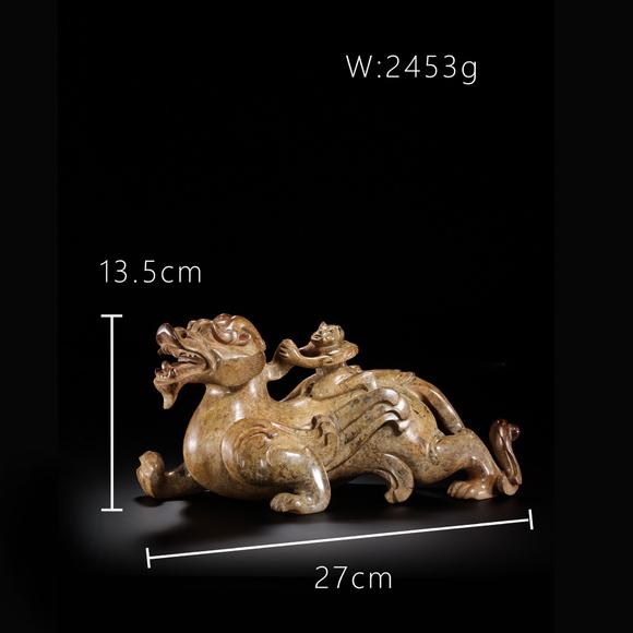 JUBAO HALL AUCTION HOUSE INCPre-Ming Dynasty Feathered Man Taming a Beast