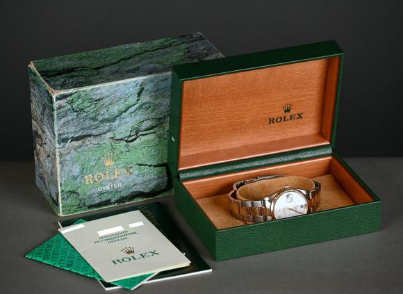 Loeckx AuctioneersRolex Oyster Perpetual Date in metal and gold with…