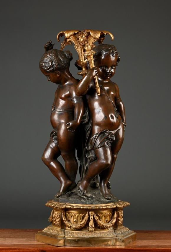 Loeckx AuctioneersA large and fine ornament in bronze \'three putti\',…