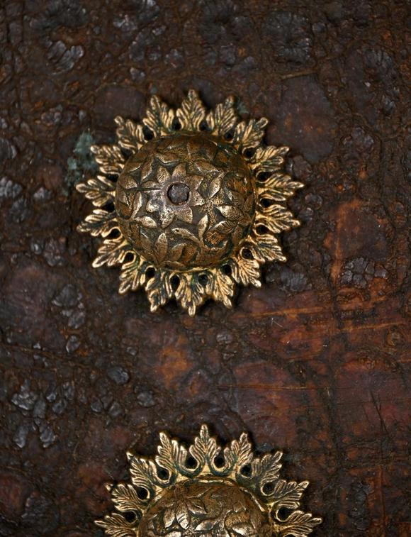 Loeckx AuctioneersCollection: an Indian metal shield and a leather s…