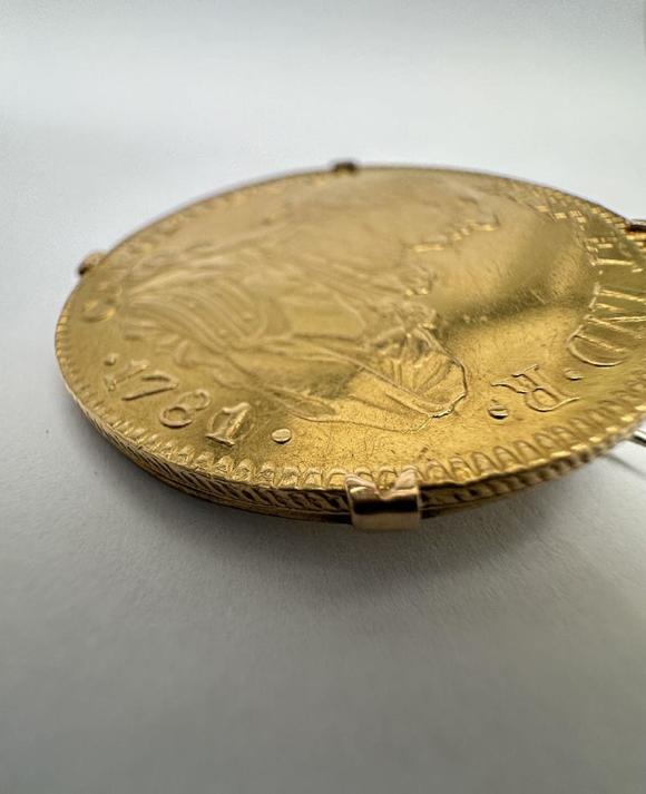 Loeckx AuctioneersCarlos III 1781: Gold coin of 8 Escudos mounted as…