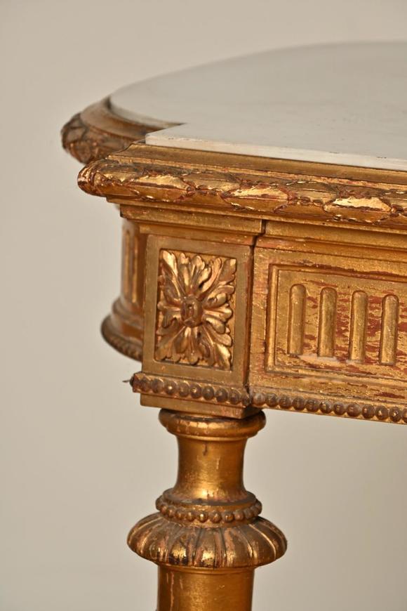 Loeckx AuctioneersGilded wooden console with marble top, Louis XVI s…