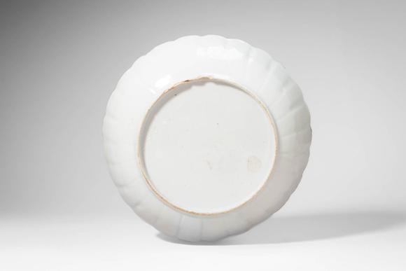 Apollo Art AuctionsMid Qing Dynasty, Ca. 18th century AD. >A famille rose porcelain dish of shallow, lobed form with