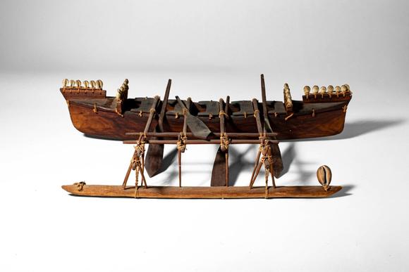 Apollo Art AuctionsCa. 20th century AD. >
A finely constructed model of a traditional Samoan outrigger canoe, carved