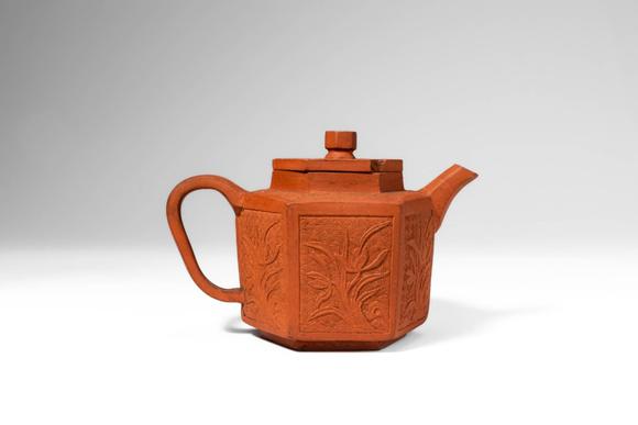 Apollo Art AuctionsKangxi Period, Qing Dynasty, Ca. AD 1661 - 1722. >
A Yixing stoneware teapot of hexagonal section