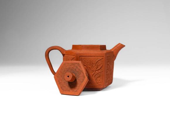 Apollo Art AuctionsKangxi Period, Qing Dynasty, Ca. AD 1661 - 1722. >
A Yixing stoneware teapot of hexagonal section
