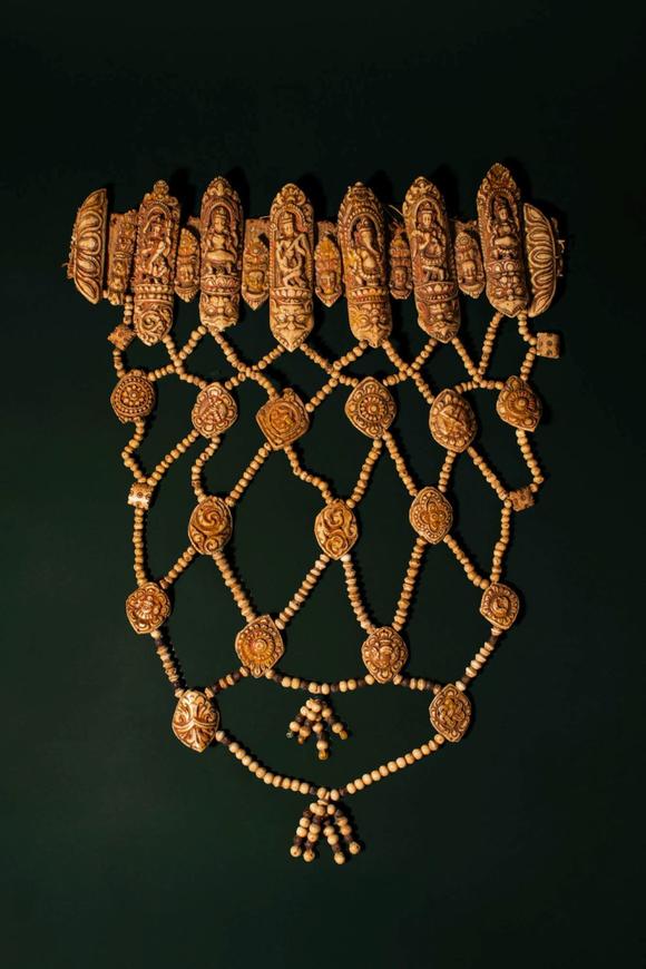 Apollo Art AuctionsCa. 16th - 17th century AD. >
An elaborate ritual bone apron composed of intricately carved plaqu