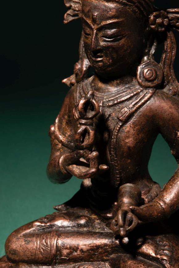 Apollo Art AuctionsCa. 14th century AD. >
A beautiful cast gilt copper alloy figure of Vajrasattva, seated in vajrap