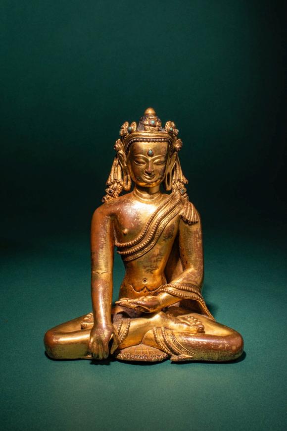 Apollo Art AuctionsCa. 15th century AD. >
A finely cast and richly gilded copper alloy figure of the Crowned Buddha