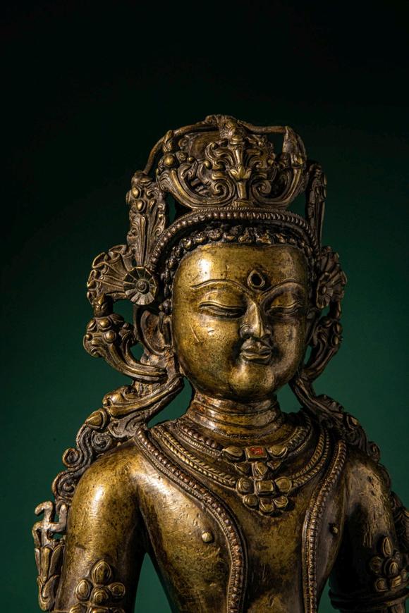Apollo Art AuctionsCa. 14th century AD. >
A finely cast copper alloy figure depicting Kunzang Akor, seated in serene