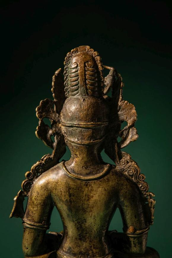 Apollo Art AuctionsCa. 14th century AD. >
A finely cast copper alloy figure depicting Kunzang Akor, seated in serene