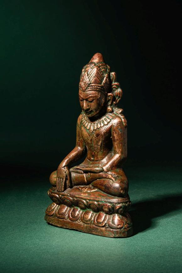 Apollo Art AuctionsCa. 12th - 13th century AD. >
A finely cast bronze figure of Buddha Shakyamuni, seated in bhumisp