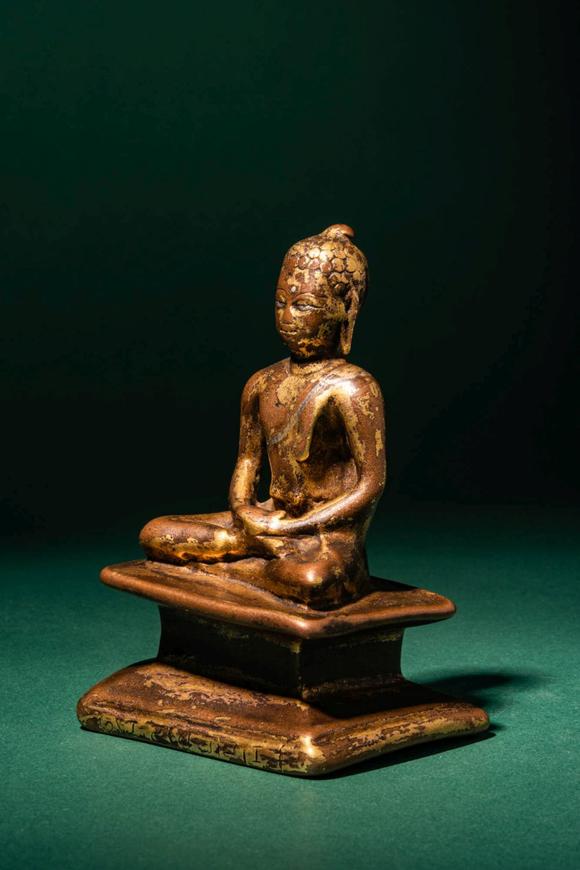 Apollo Art AuctionsCa. 6th - 7th century AD. >
A cast bronze figure of Buddha Shakyamuni seated in dhyanasana (medit
