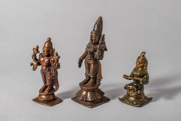 Apollo Art AuctionsCa. 18th-19th century AD. A refined group of three South Indian bronze figures depicting Vishnu,