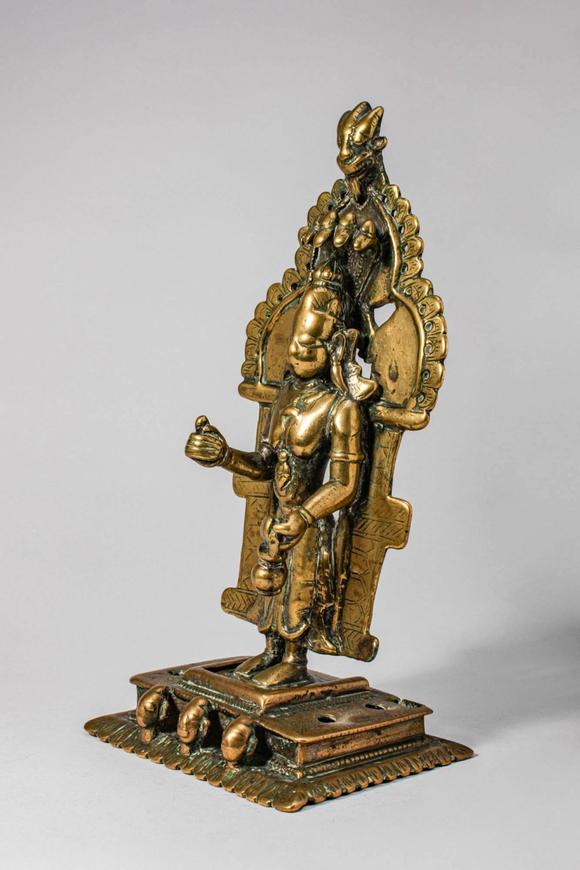 Apollo Art AuctionsCa. 17th-18th century AD.
A cast brass figure of Jina Parsvanatha, the 23rd Tirthankara, standing