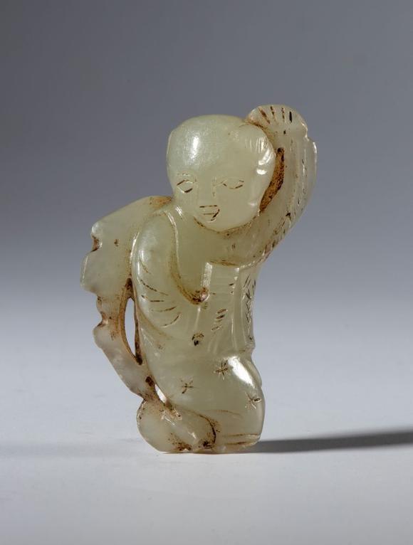 Bertolami Fine ArtSmall Hotan jade sculpture depicting a boy with a kite. China, 19th century