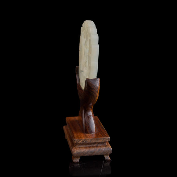 Oakridge Auction Gallery十八世紀 白玉鏤雕鸚鵡佩（附木座）  A Chinese reticulated white jade 'parrot' plaque