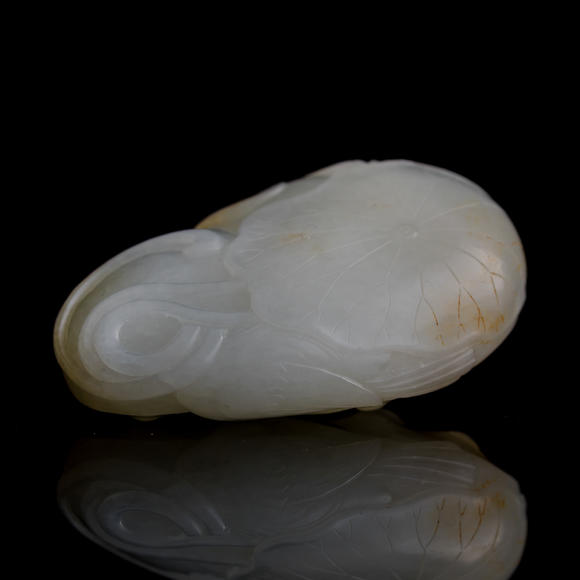 Oakridge Auction Gallery十八/十九世紀(jì) 白玉雕蓮蓬把件  A Chinese carved white jade carving of a lotus pod