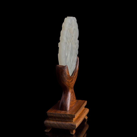 Oakridge Auction Gallery十九世紀(jì)早 白玉鏤雕童子佩（附木座）  A Chinese reticulated white jade 'boy' plaque