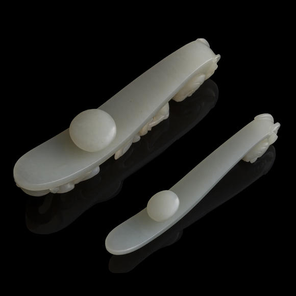 Oakridge Auction Gallery清代 白玉雕龍鉤兩根  Two Chinese white jade dragon hooks