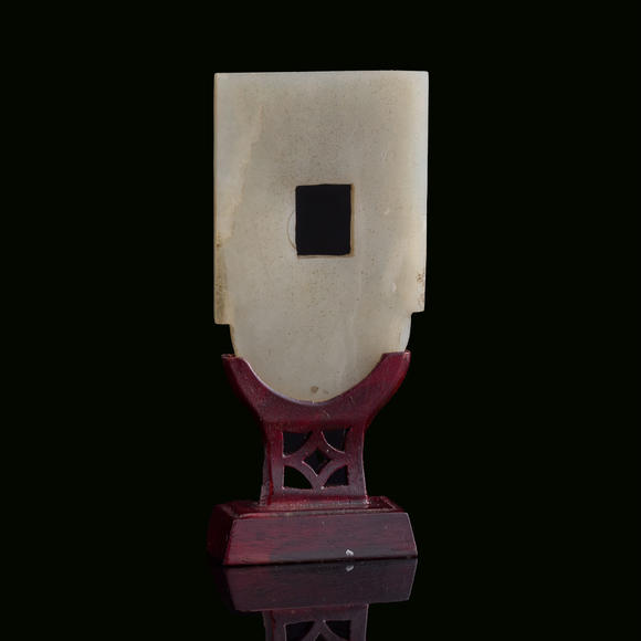 Oakridge Auction Gallery十九世紀 白玉雕螭龍紋斧形佩（附木架）  A Chinese carved white jade 'chilong' axe-form plaque