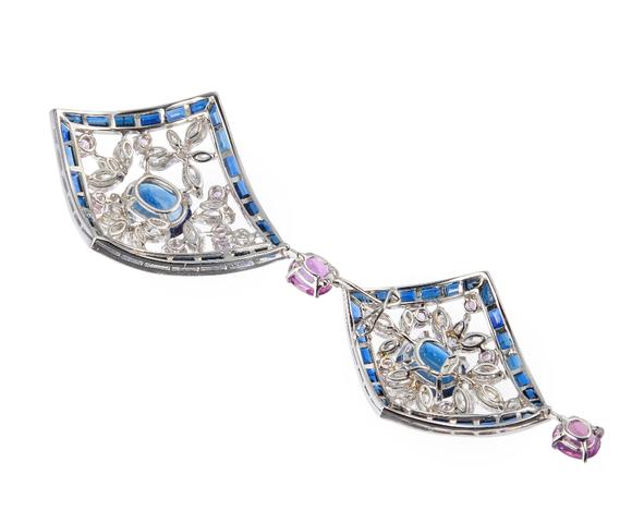 RoseberysA sapphire, diamond and pink sapphire pendant, composed of two lozenge shaped cluster panels, each panel with central single oval mixed-cut sapphire i