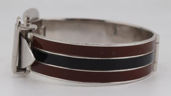 Clarke Auction GalleryJEWELRY. Gucci Brown and Black Enamel Bracelet.