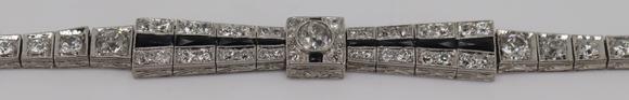 Clarke Auction GalleryJEWELRY. Art Deco Platinum, Diamond and Onyx
