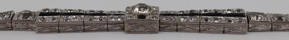 Clarke Auction GalleryJEWELRY. Art Deco Platinum, Diamond and Onyx
