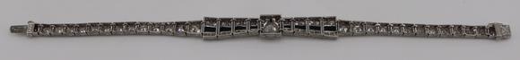 Clarke Auction GalleryJEWELRY. Art Deco Platinum, Diamond and Onyx