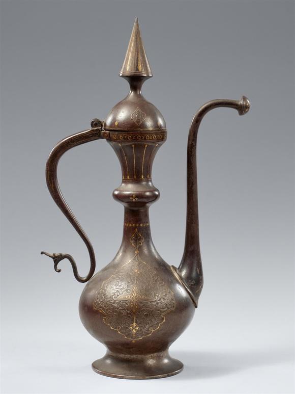 Kunsthaus Lempertz KGAn elegant Qajar gold damascened steel ewer. 19th century