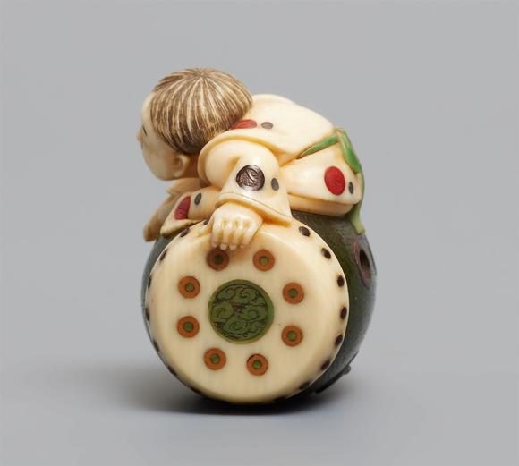 Kunsthaus Lempertz KGA partly stained netsuke of a boy by Kodama Yoshiaki. Late 19th century