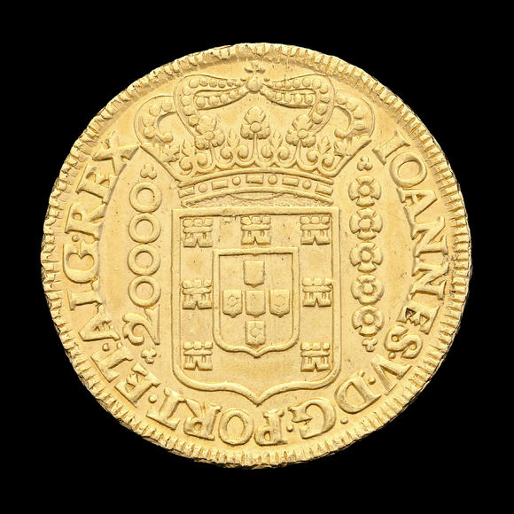 Piguet - H?tel des VentesBrésil, Jo?o V (1724-1750), 20.000 reis en or, 1726, Minas Gerais, tranche feuillagée, diam. 3,8 cm, 53,4 g.