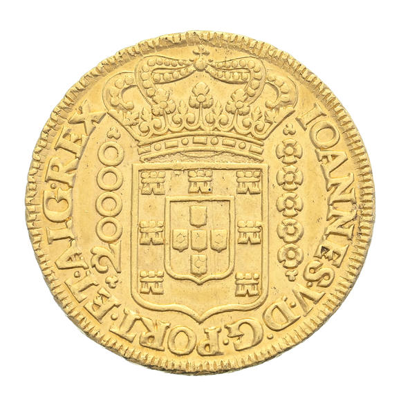 Piguet - H?tel des VentesBrésil, Jo?o V (1724-1750), 20.000 reis en or, 1726, Minas Gerais, tranche feuillagée, diam. 3,8 cm, 53,4 g.