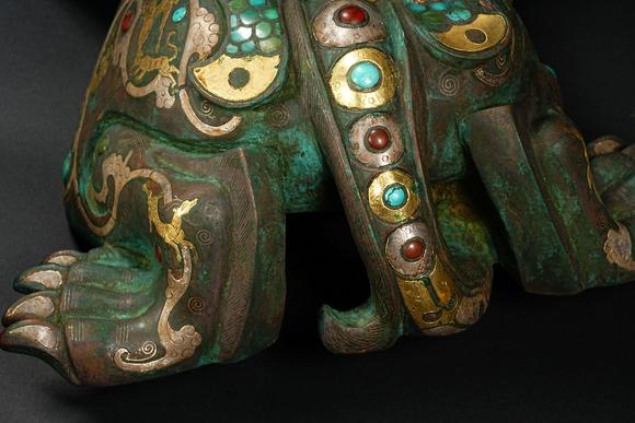 HUNG YUN ZHAI AUCTION HOUSE INCPre-Ming Dynasty Gold and Silver Inlaid Inscribed Mythical Beast