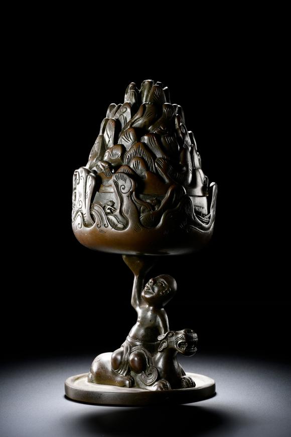 HUNG YUN ZHAI AUCTION HOUSE INCBronze Boshan Incense Burner with Central Asian (Hu) Figure Riding a Beast