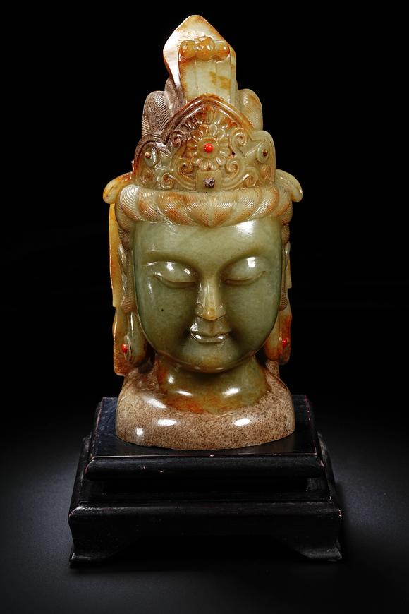 HUNG YUN ZHAI AUCTION HOUSE INCPre-Ming Dynasty Hetian Jade Guanyin Head