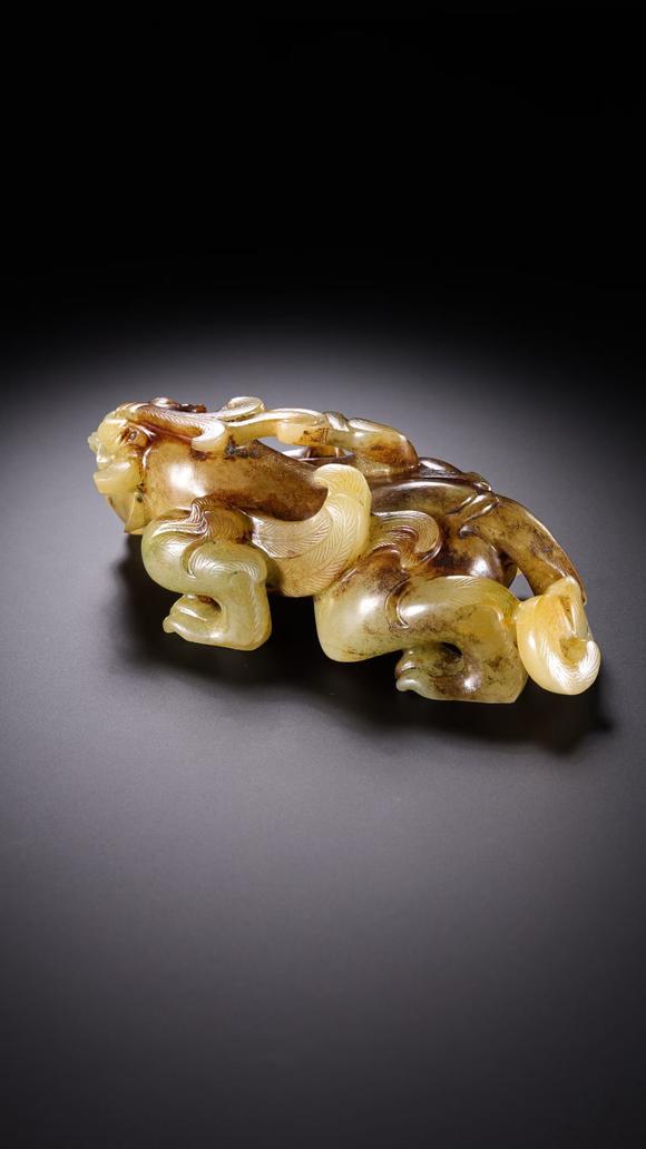 HUNG YUN ZHAI AUCTION HOUSE INCPre-Ming Dynasty Hetian Jade Auspicious Beast