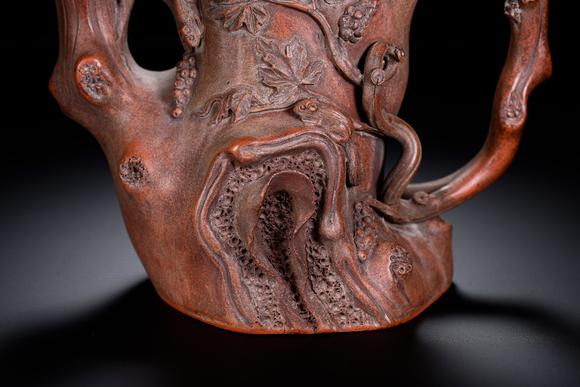 HUNG YUN ZHAI AUCTION HOUSE INCZhu Kexin-marked Squirrel and Grape Tree Stump Yixing Zisha Teapot